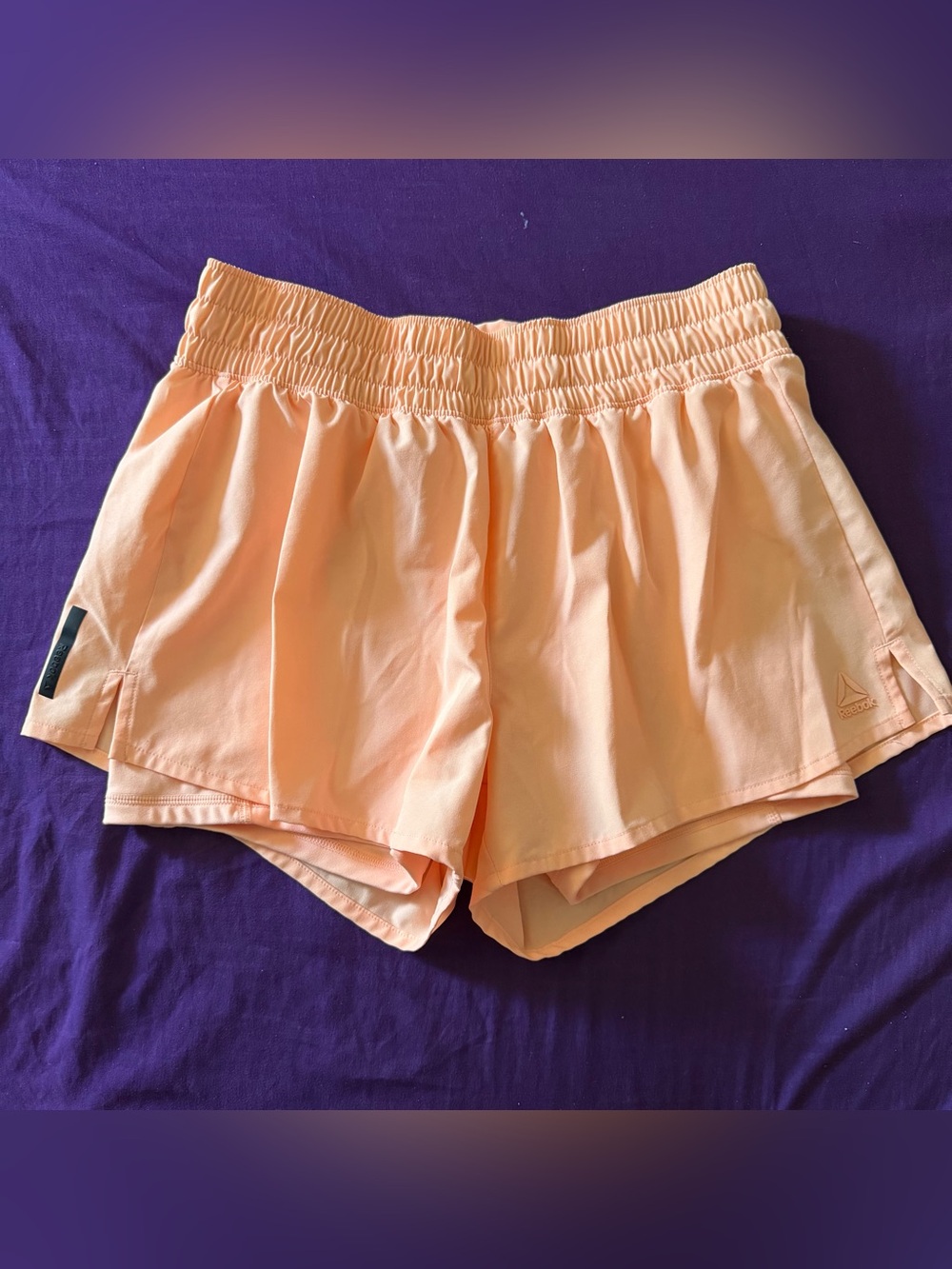 Reebok - peach running shorts